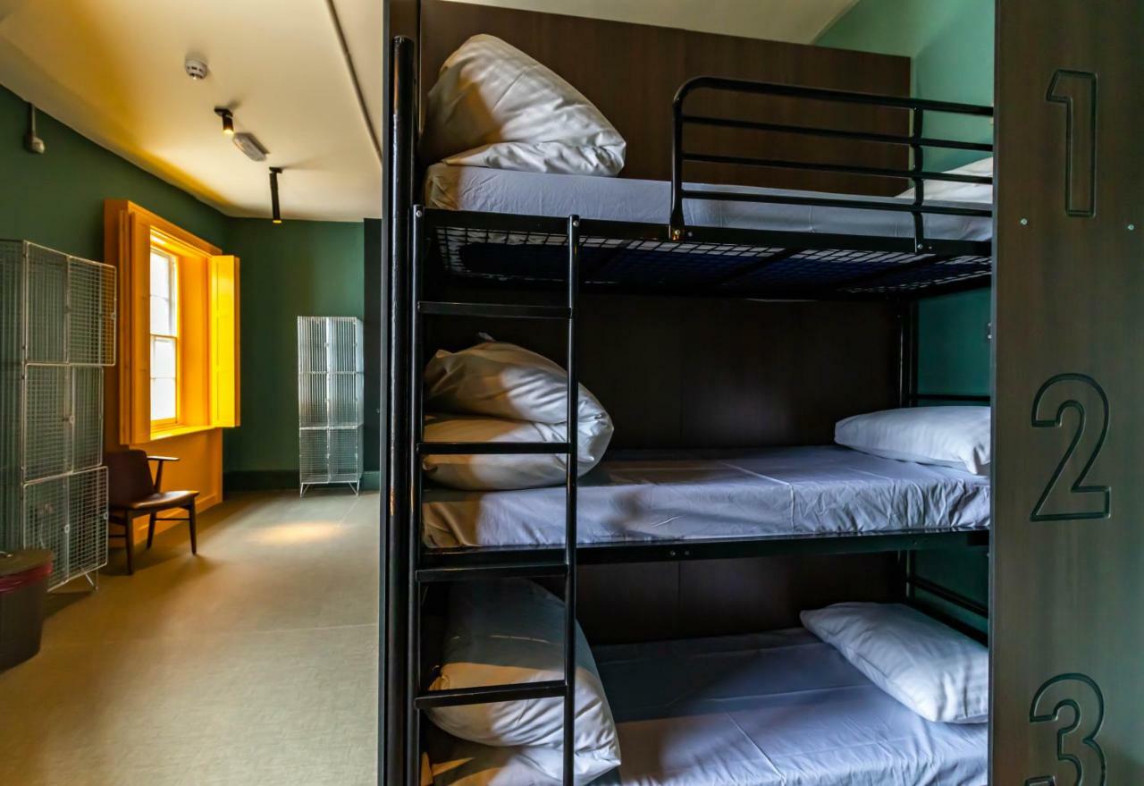 Bed in 9-Bed Female Dormitory Room with Shared Bathroom
